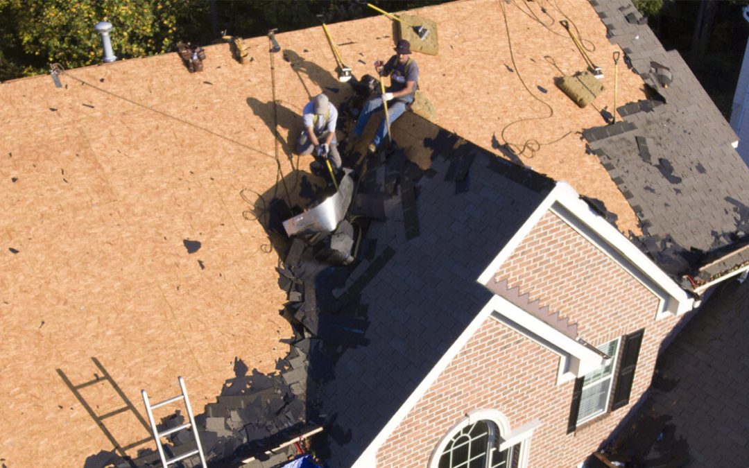 How to Tear Shingles Off a Roof